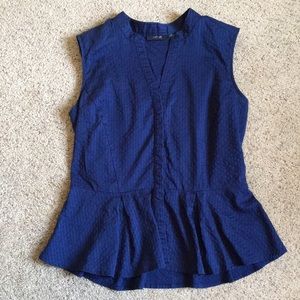 Peplum sleeveless blouse
